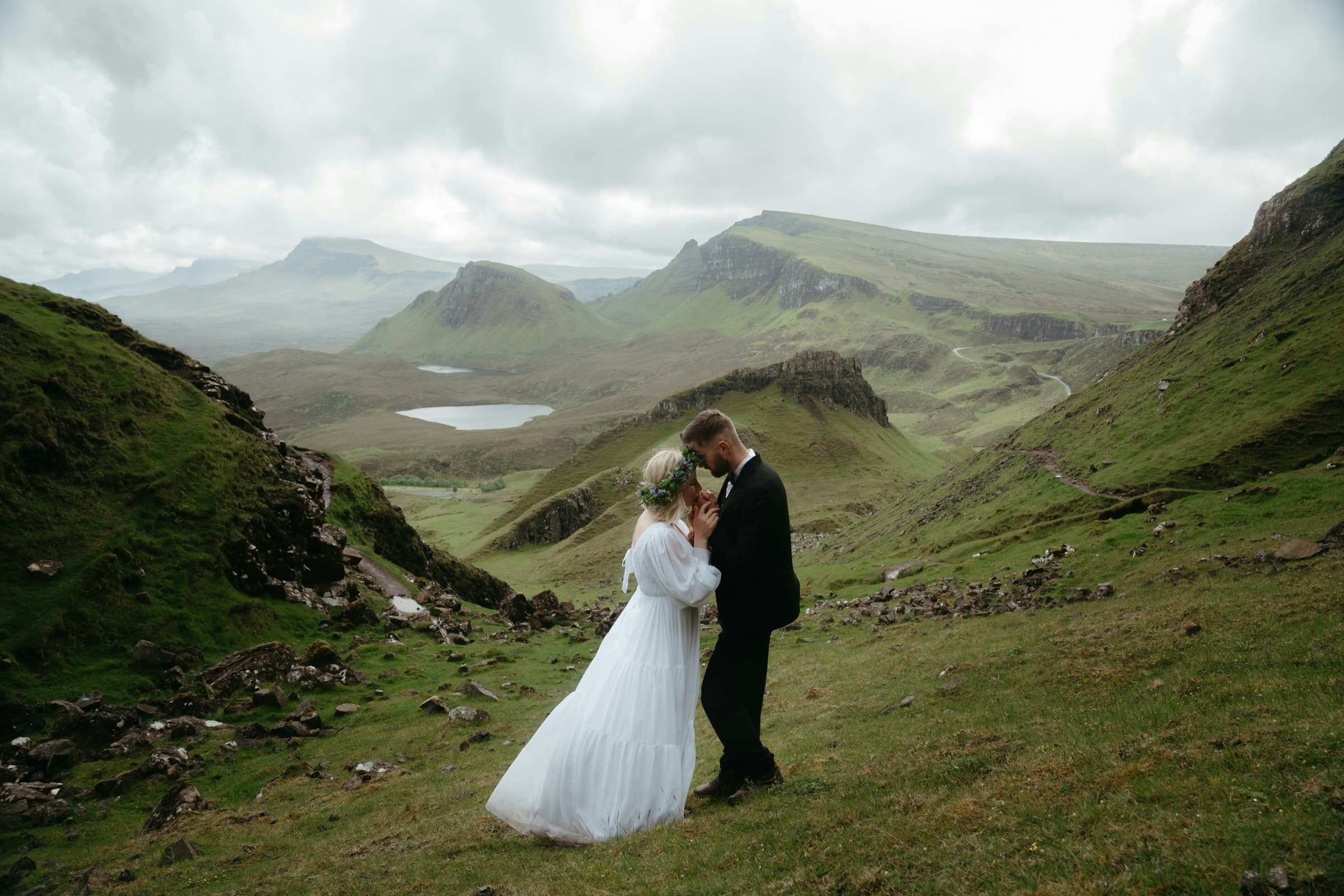Outdoor wedding ceremony at a UK venue with mountain scenery